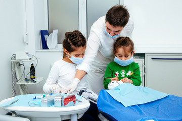 Treatment office children dentist teeth small girl teen red doctor new year discount woman clean clinic quietly comfortably