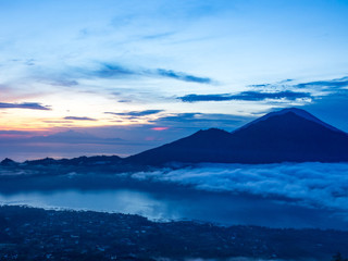 Batur volcano on the sunrise. Indonesia, autumn. It's an active volcano located at the center of two concentric calderas