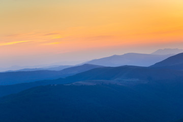 Sunset on the peak of mountain 