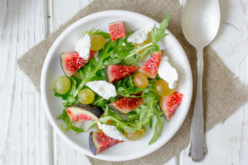 Top view of fig and goat cheese salad.