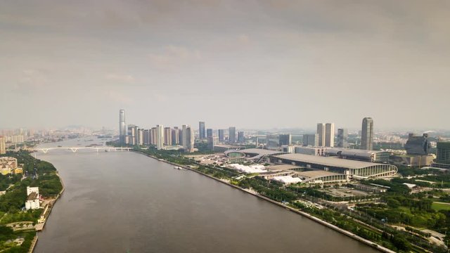 sunny day guangzhou city famous convention and exhibition centre aerial panorama 4k timelapse china
