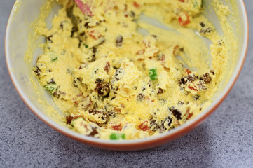 bowl with mix cottage cheese and candied fruit