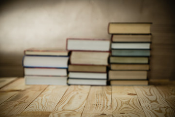 Textbooks and books on a wooden table