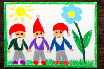 Colorful drawing: three smiling dwarfs in red hats