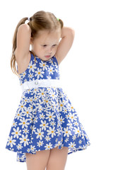 Fashionable little girl in a dress