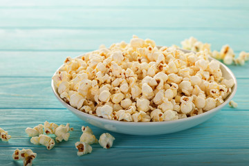 Cheddar cheese popcorn in a white bowl
