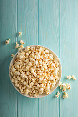 Cheddar cheese popcorn in a white bowl