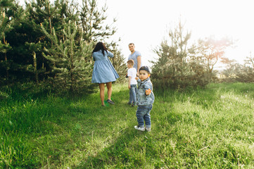 Family Dad Mom and Children in the Field