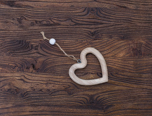 decorative heart on a wooden background