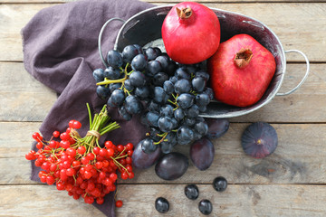 Ripe fruits and berries on table