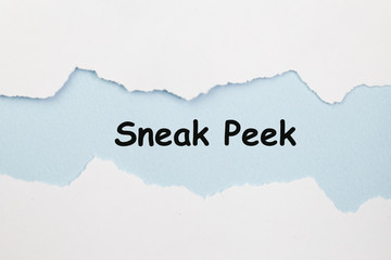 The phrase Sneak Peek appearing behind torn paper.