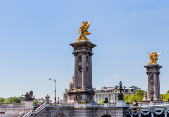 Fragment of the Alexander III Bridge across the Seine in Paris, France. View from the water
