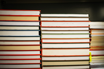 Stack of old books in shelf