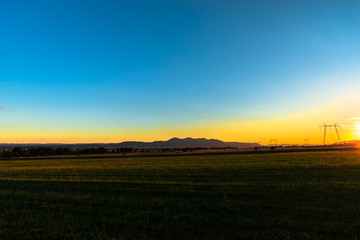 Obraz premium Electric pylon at sunset