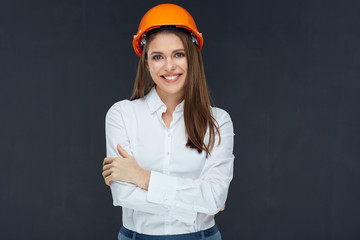 Businesswoman wearing builder helmet isolated portrait