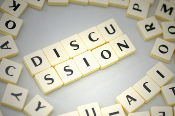 text discussion on the gray background near the letters.