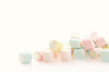 Pastel colourful marshmallows isolated in white background
