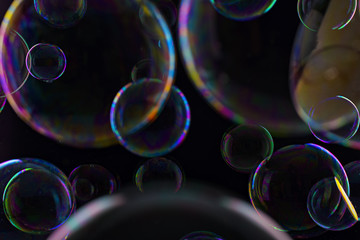 Soap bubbles on a black background - 182613844