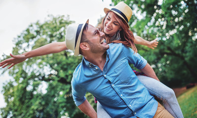 Dating in the park. Young couple having fun in the park. Love, dating, romance