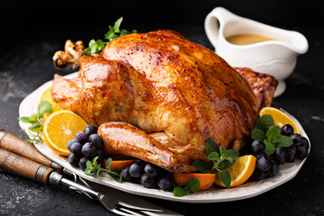 Festive celebration roasted turkey for Thanksgiving - obrazy, fototapety, plakaty