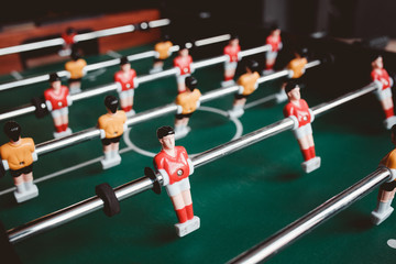 Fototapeta na wymiar table football close-up. Players game in football.