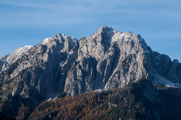 The rugged peak of mount Jalovec in Slovenia on a sunny autumn morning