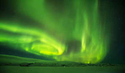Fototapeta na wymiar Beautiful aurora borealis in Iceland, shot in early winter period