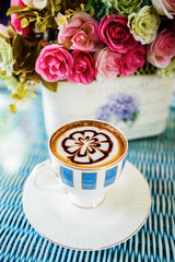 Cup of coffee on table in the morning