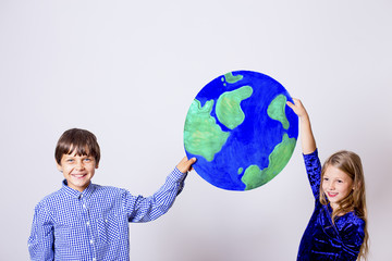 Kids with a globe