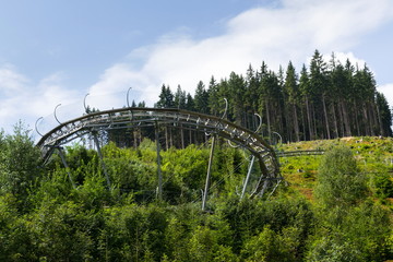 Bobsled Roller Coaster Toboggan in summer day, Rittisberg, Alps, Austria