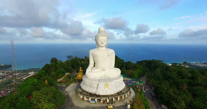 blue sky and blue ocean are on the back of Phuket Big Buddha statue.white Phuket big Buddha is the one of landmarks on Phuket island.