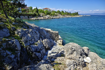 Fototapeta na wymiar The rocky Adriatic coastline in Porat village. The island of Krk, Croatia