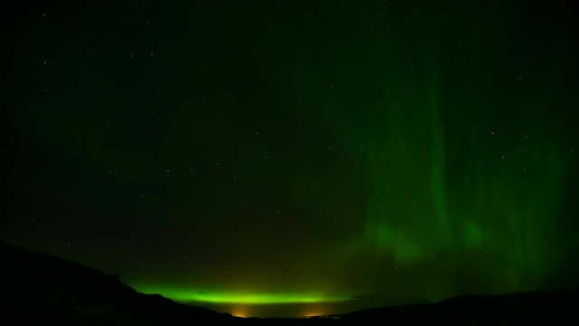 Time lapse of beautiful aurora borealis northern light in Iceland, shot in early winter period