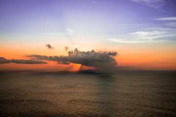 Obraz na płótnie Canvas Sun behind the cloud Malta