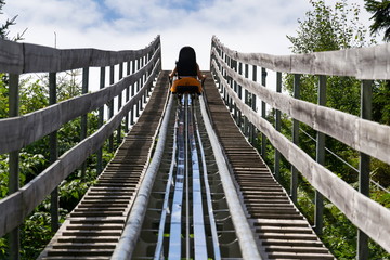 Bobsled Roller Coaster Toboggan in summer day, Rittisberg, Alps, Austria