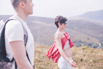 boy and girl in mountains