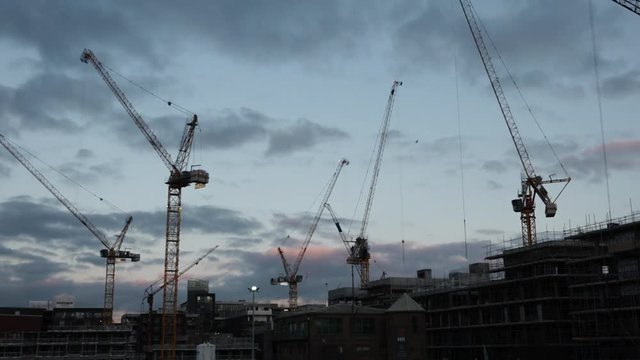 UK November 2017 - time lapse of cranes on a construction site at sunset.