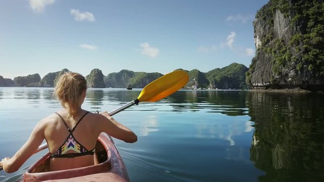 Panoramic View Quiet Bay and Girl in Kayak on Foreground