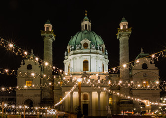 Vienna, Austria, traditional Christmas market in the city center at Karls church (in German...