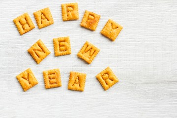 Happy New year message with cheese crackers