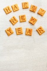 Happy New year message with cheese crackers
