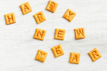 Happy New year message with cheese crackers