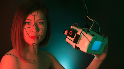 Beautiful robot girl with a helmet of virtual reality. Cyberpunk