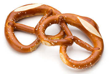 Pretzel isolated on white. Fresh fragrant brezel top view.