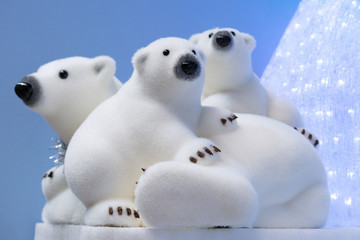 Christmas and New Year decorations: figurines of a white polar bear with cubs.