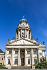 Fototapeta na wymiar Exterior view of Franzosische Dom (German for French Church) at Gendarmenmarkt square in Mitte district in Berlin, Germany