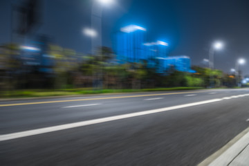 empty asphalt road front of modern buildings.
