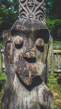 The Face of traditional Dayaknese (native tribe of Kalimantan/ Borneo) wood sculpture / totem that used for traditional ceremony in Pulau Kumala, Indonesia