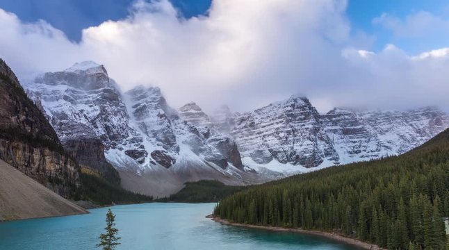 Time lapse Moraine Lake morning fog in Banff National Park, Alberta, Canada.