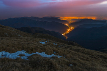 Valley lights at dusk, Brescia province, Lombardy district, Italy